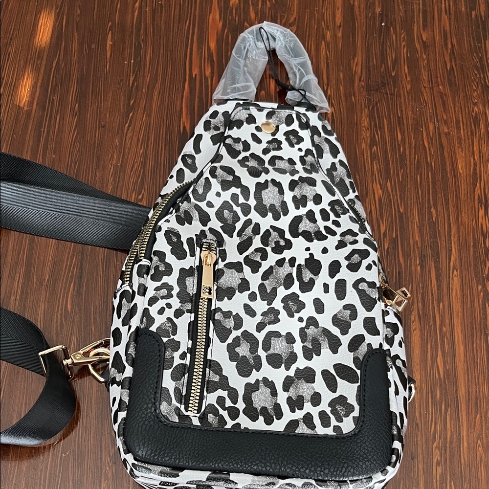 NWOT snow Leopard Print leather Sling Bag!